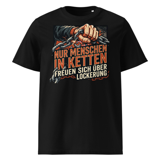 Herren Bio-Baumwolle T-Shirt in Schwarz mit Statement-Print "Nur Menschen in Ketten freuen sich über Lockerung" – männlicher Model trägt das Shirt in urbaner Stadtkulisse bei strahlendem Sonnenschein und blauem Himmel – GOTS-zertifiziert, nachhaltige Streetwear von TextilRebell