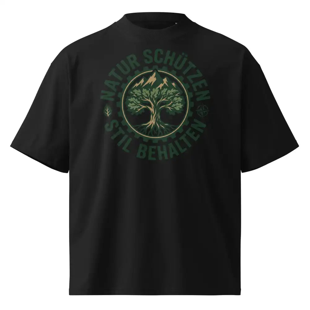 Herrenmodel in schwarzem Oversized-T-Shirt mit „Natur schützen, Stil behalten“-Motiv, 100 % Bio-Baumwolle, 200 g/m², Bio-Baumwollanteil GOTS-verifiziert.
